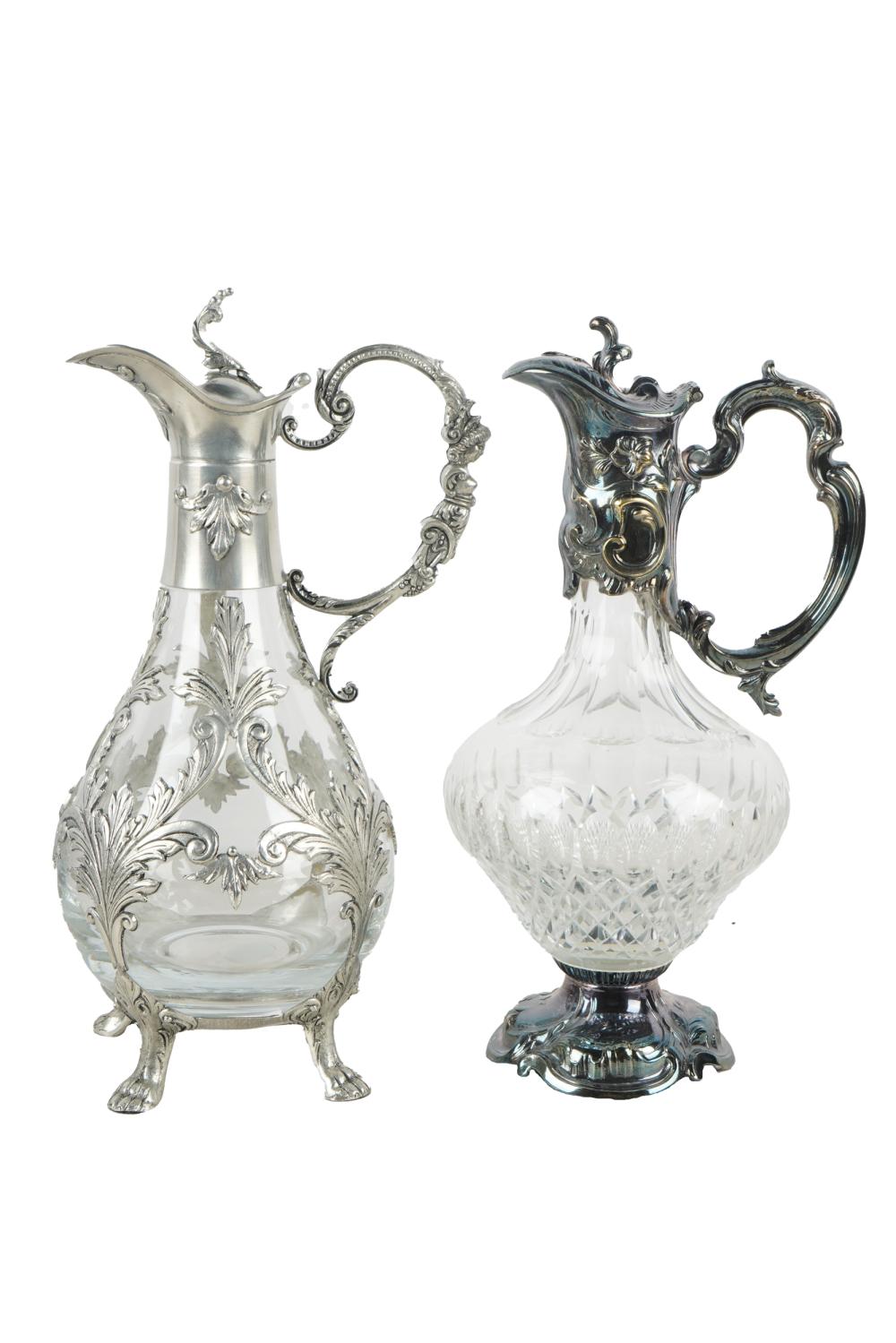 Appraisal: TWO SILVERPLATE GLASS EWERSthe first with pewter marks with paper