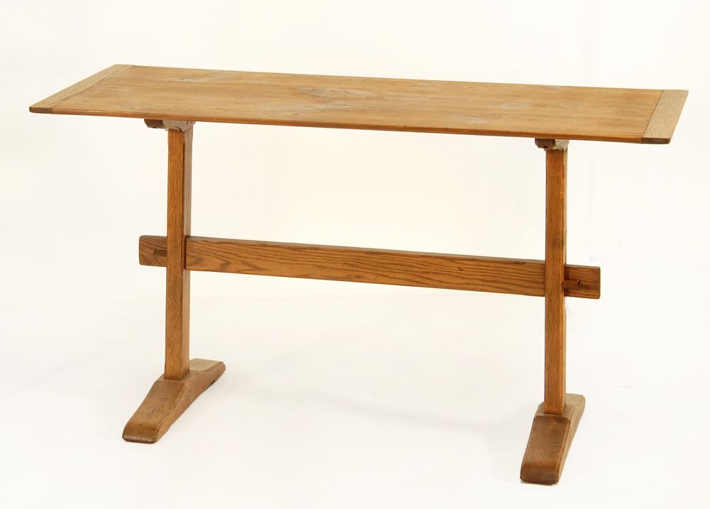 Appraisal: CUSTOM-MADE TRESTLE TABLE th CenturyIn chestnut and pine with breadboard