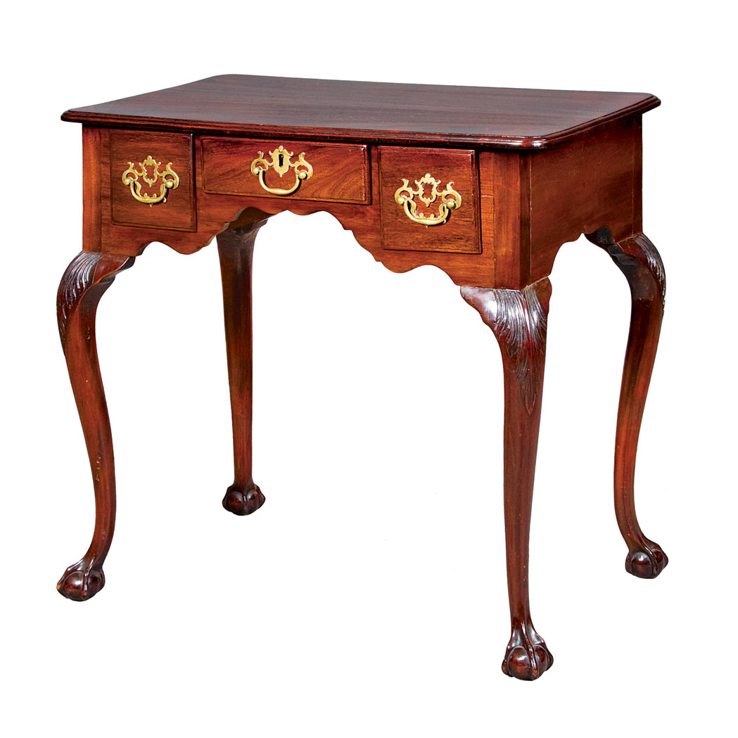 Appraisal: George II Mahogany Dressing Table The molded rectangular top above