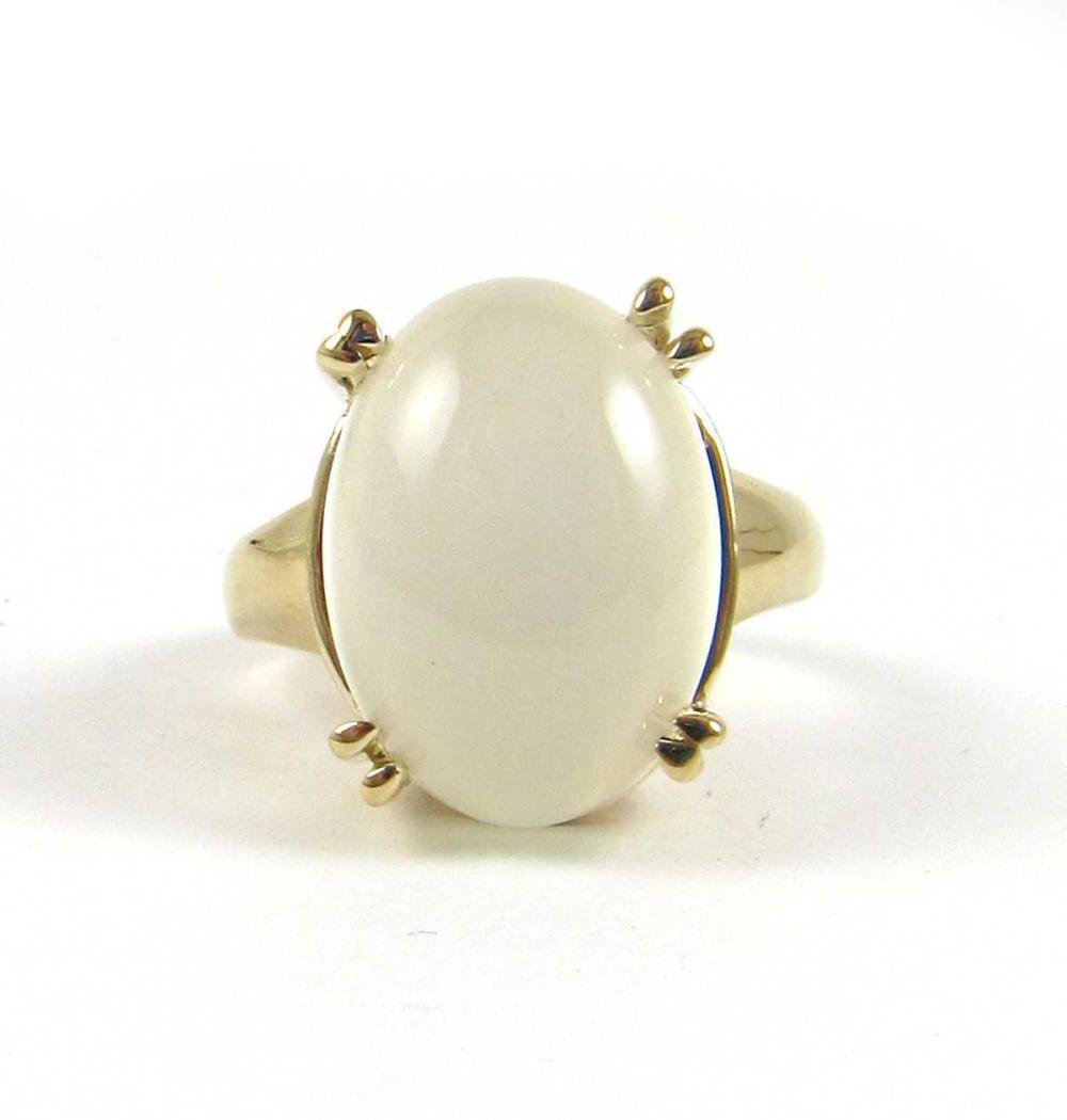 Appraisal: CAT'S EYE MOONSTONE AND FOURTEEN KARAT GOLD RING The k