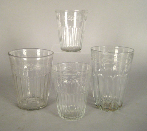 Appraisal: Four blown colorless flip glasses early th c each with