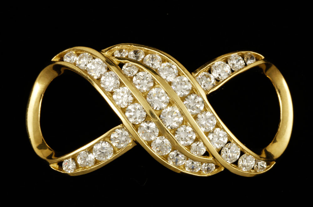 Appraisal: A - K Gold Pendant K yellow gold cubic zirconia