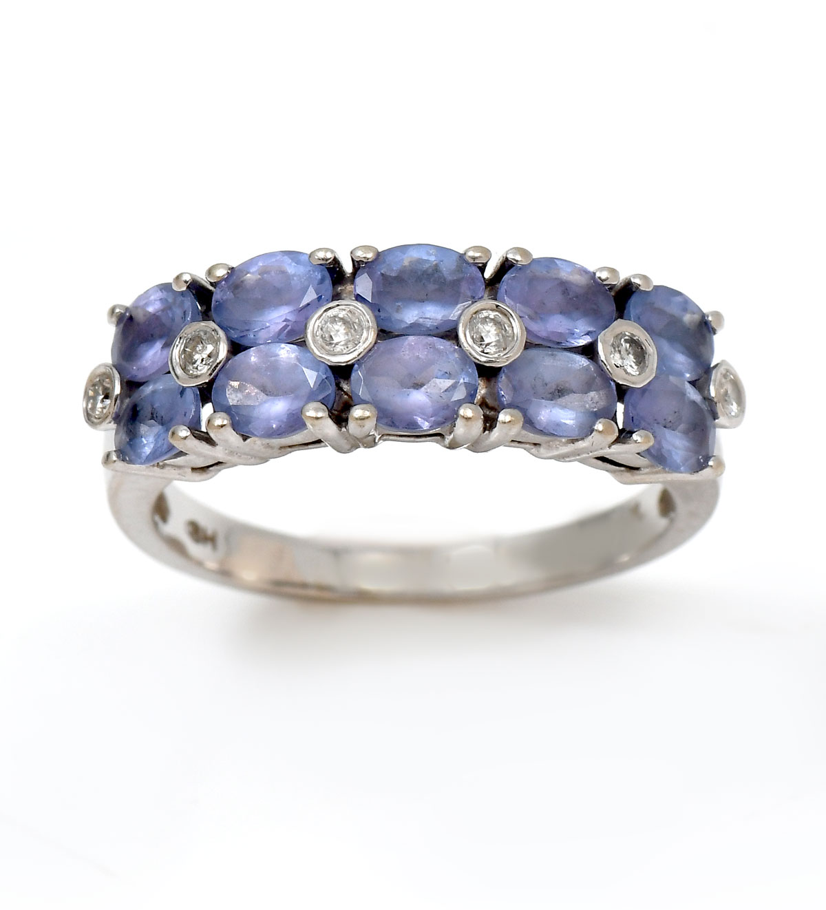 Appraisal: K TANZANITE DIAMOND BAND K white gold diamond band contains