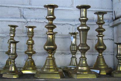 Appraisal: Group of brass candlesticks th th century Of various forms