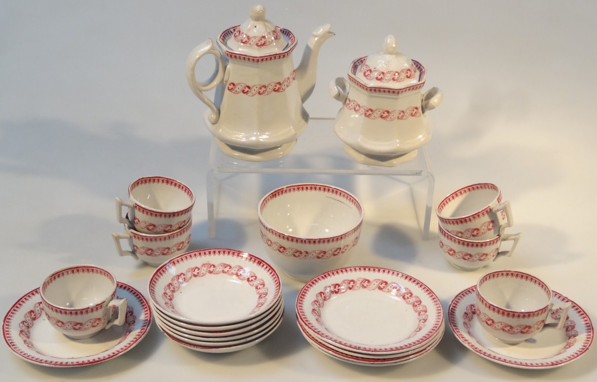 Appraisal: A Victorian Staffordshire pottery child's part tea set each piece