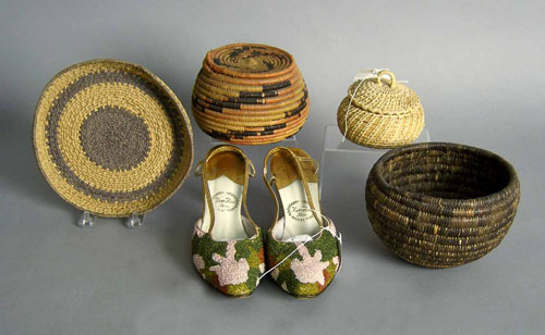 Appraisal: Four woven baskets together with a pair of beaded shoes