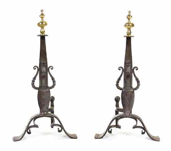 Appraisal: A Pair of Neoclassical Brass and Iron Andirons each with