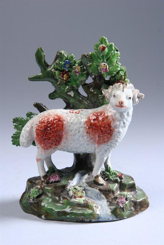 Appraisal: STAFFORDSHIRE PEARLWARE FIGURE OF A SHEEP Circa - in high