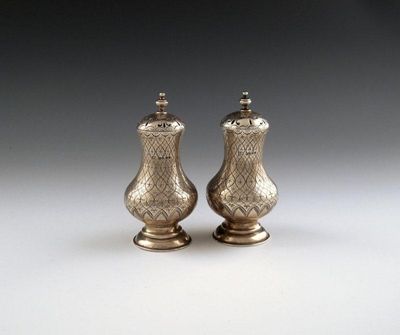 Appraisal: A pair of Victorian silver casters by J and J