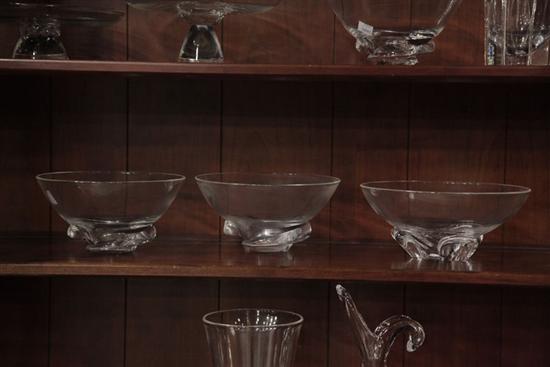 Appraisal: THREE STEUBEN CRYSTAL BOWLS A pair with swirl bases ''