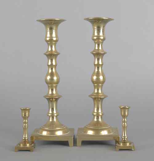 Appraisal: Group of lighting to include two brass candlesticks and three