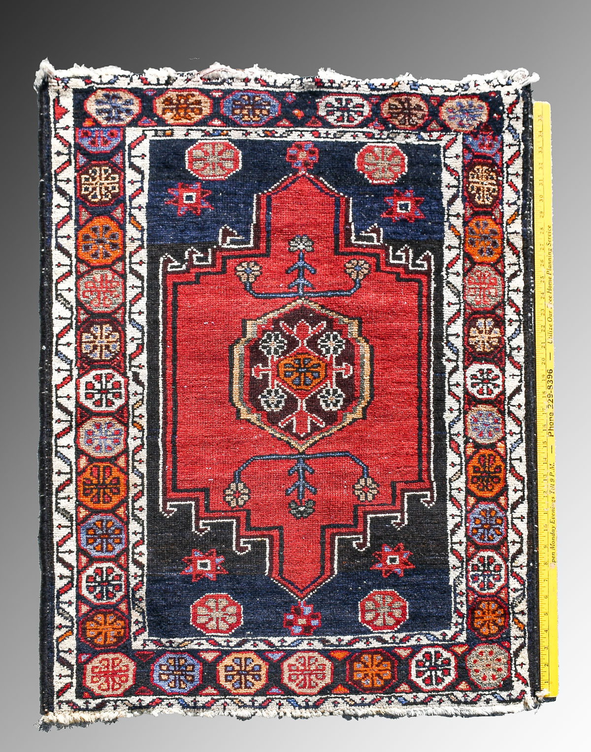 Appraisal: CAUCASIAN HAND KNOTTED WOOL RUG ' '' X ' ''