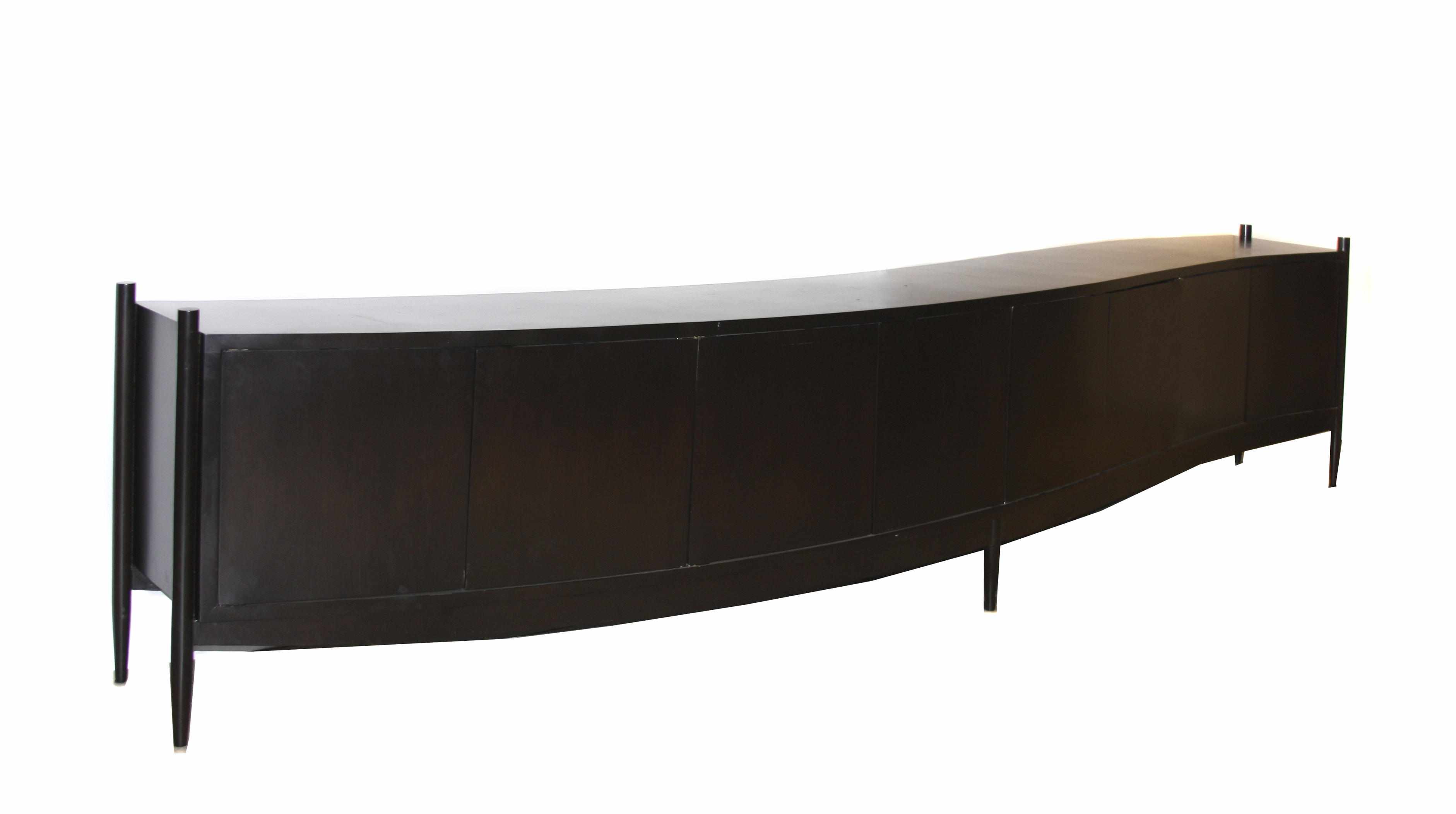 Appraisal: A Mexican ebonized wood serpentine buffet circa height width in