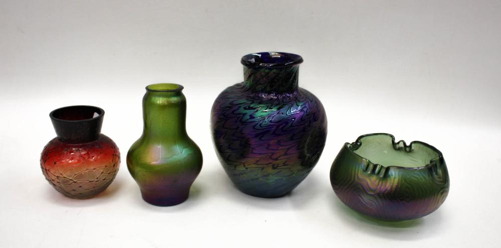 Appraisal: FOUR BOHEMIAN ART GLASS VESSELS in the manner of Loetz