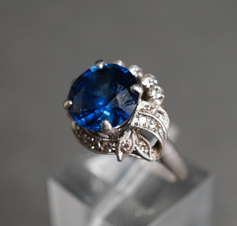 Appraisal: Tested Platinum Blue Zircon and Diamond Ring Zircon measuring approx