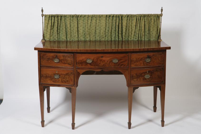 Appraisal: A GEORGE III MAHOGANY BOW FRONTED SIDEBOARD the shaped top