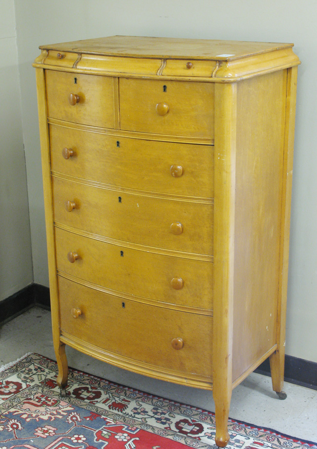 Appraisal: LATE VICTORIAN MAPLE DRESSER American c the bow front featuring