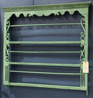 Appraisal: French Provincial style green painted wall hanging plate rack decorated