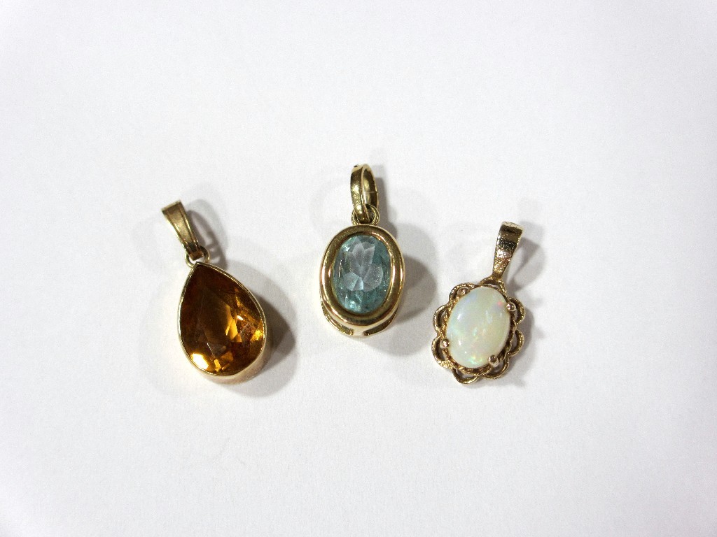 Appraisal: Three ct gold gem pendants set with opal citrine and