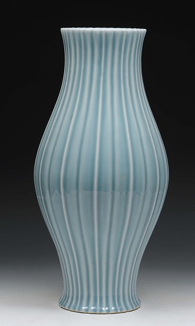 Appraisal: A Chinese pale blue baluster vase th Centuryof reeded form