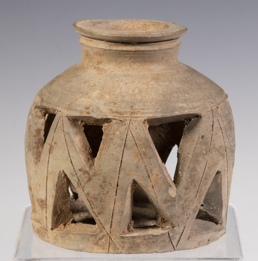 Appraisal: ARCHAIC CHINESE PIERCED POTTERY VESSEL Bottle Form Censer in terracotta