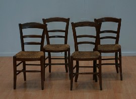 Appraisal: Four beech and raffia occasional chairs