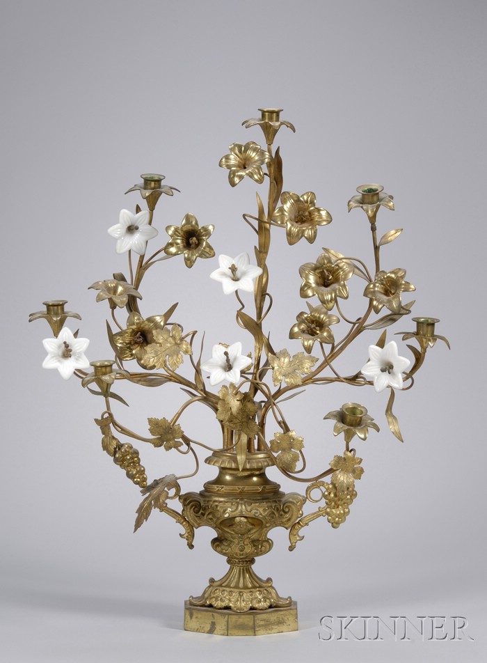 Appraisal: Victorian Gilt-metal and White Glass Blossom Seven-Light Figural Candelabra ht