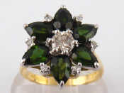 Appraisal: An carat gold tourmaline and diamond ring the central round