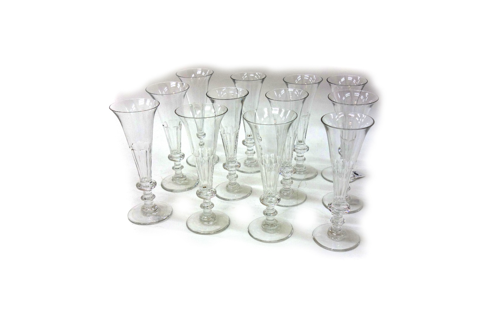 Appraisal: A set of twelve Regency style glass champagne flutes by