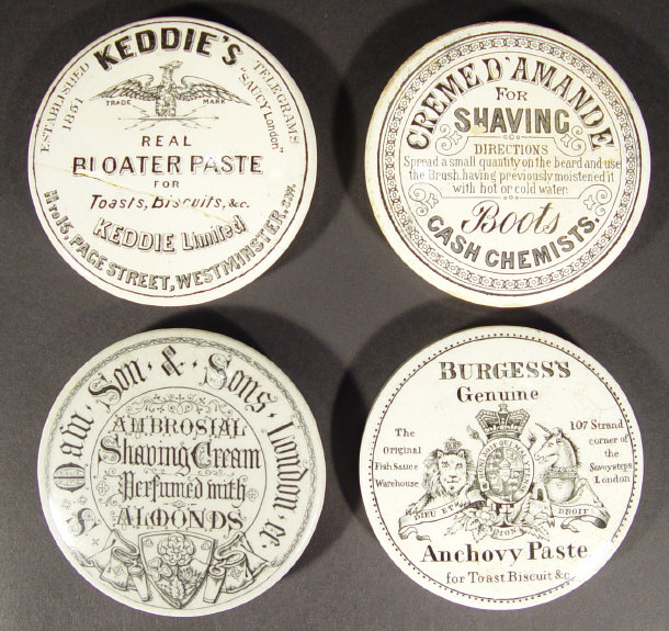 Appraisal: Four Victorian advertising pot lids transfer printed with black decoration