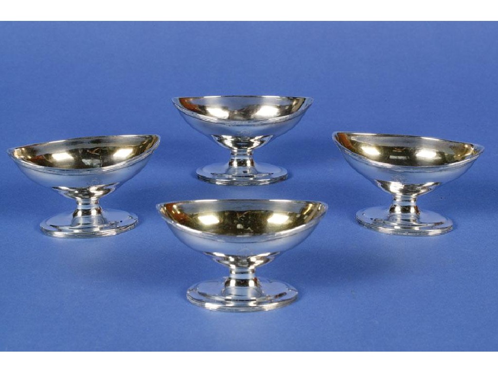 Appraisal: A SET OF FOUR GEORGE III PEDESTAL SALTS of navette