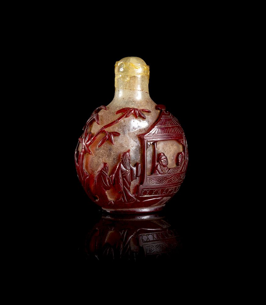 Appraisal: A Chinese Red Overlay Snowflake Ground Glass Snuff Bottle Height