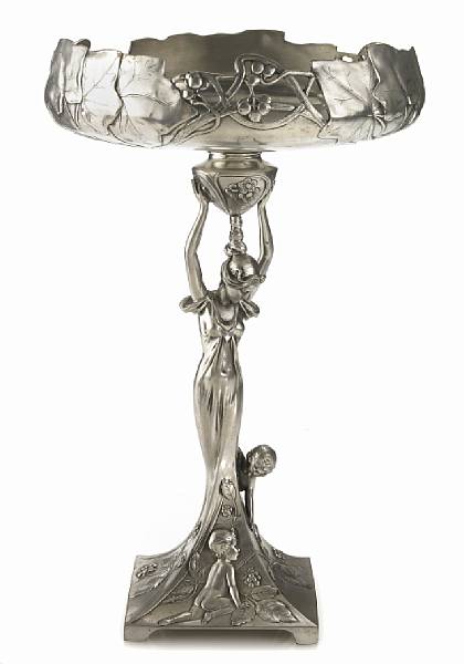 Appraisal: An Art Nouveau pewter figural compote designed by Achille Gamba