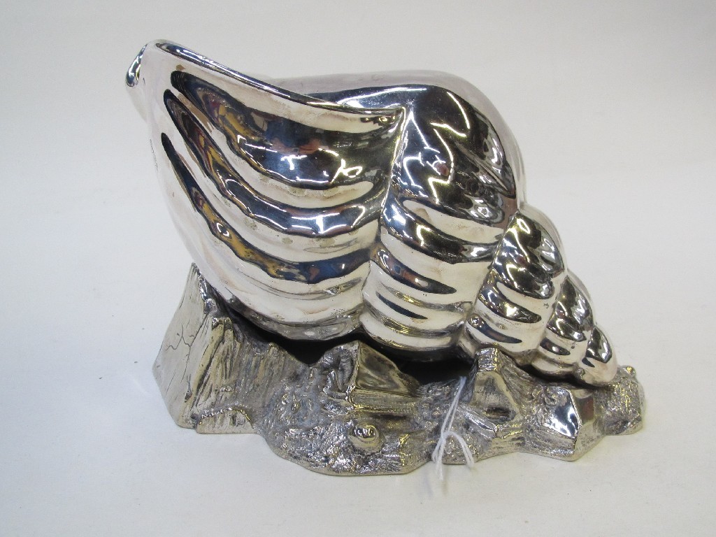 Appraisal: Silver plated spoon warmer modelled as a shell