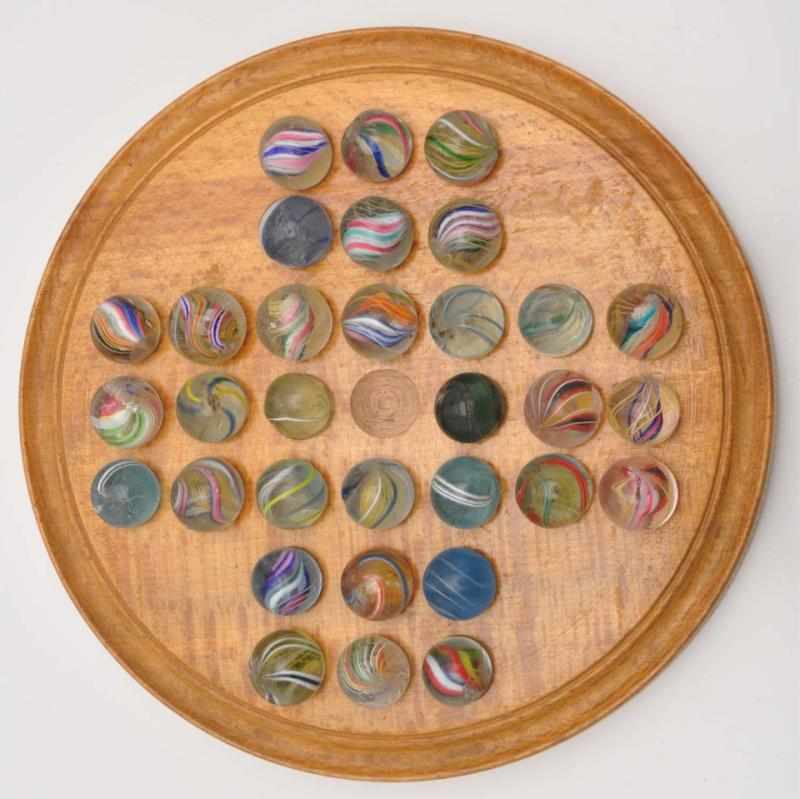 Appraisal: Solitaire Board Set Game Description Solitaire board with swirl marbles