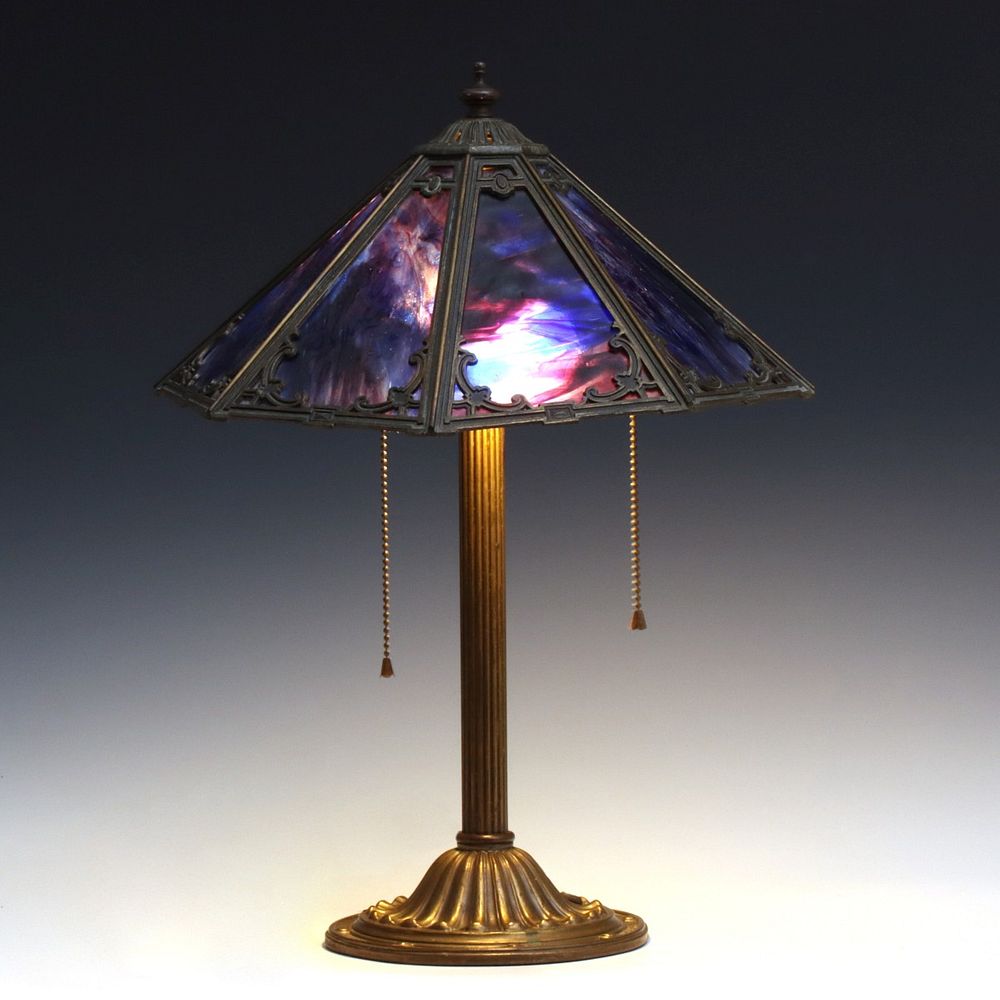 Appraisal: A BRADLEY AND HUBBARD LAMP WITH PURPLE AND BLUE GLASS