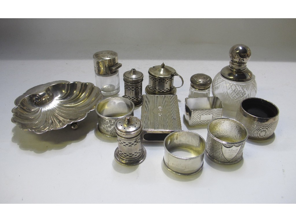 Appraisal: A lot comprising silver shell shaped dish scent bottles napkin