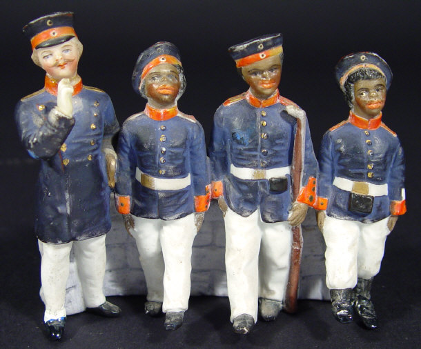 Appraisal: Military interest comical bisque figure group of an Imperial German