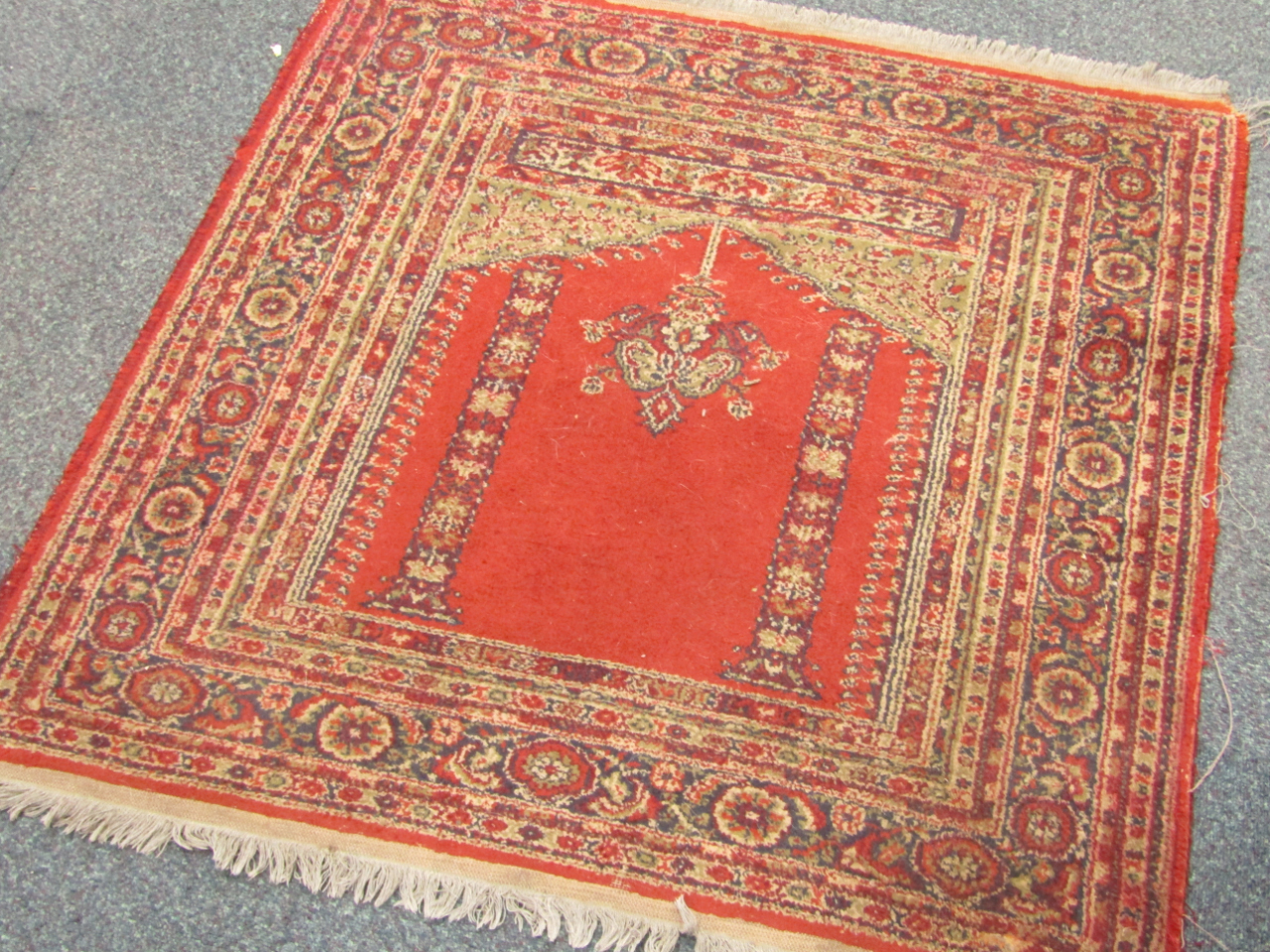 Appraisal: A Caucasian prayer rug decorated with a lantern columns and