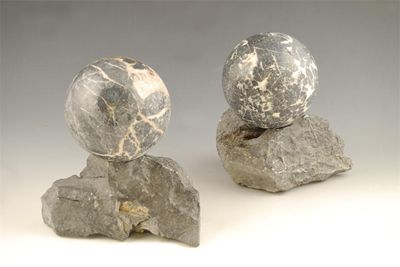 Appraisal: A pair of marble globes in cm dia on rough