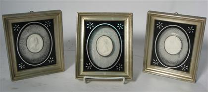 Appraisal: Three piece Wedgwood style bisque oval medallionsOf a classically draped