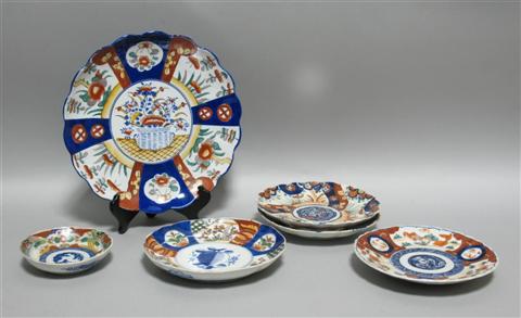 Appraisal: FOUR JAPANESE IMARI FLUTED DISHES Late th century each of