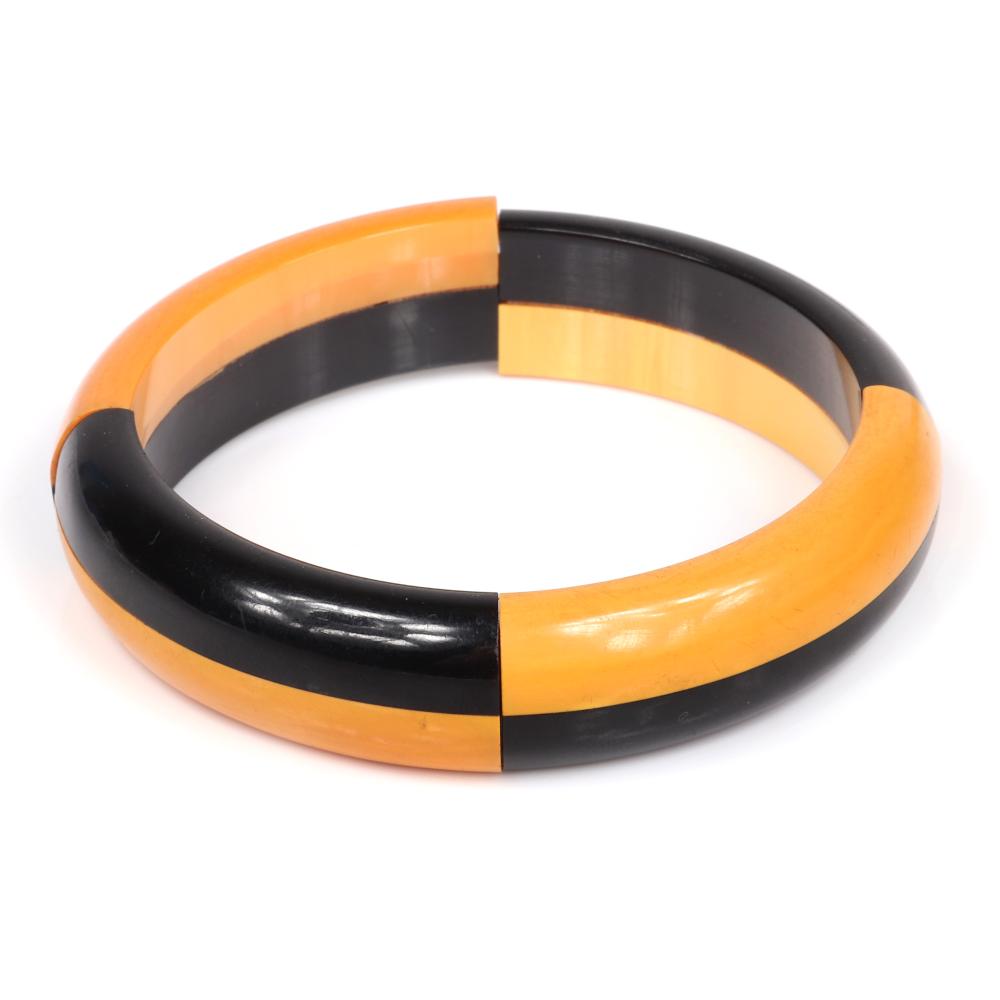 Appraisal: BAKELITE ART DECO STRETCH BRACELET WITH LAMINATED BUTTERSCOTCH AND BLACK