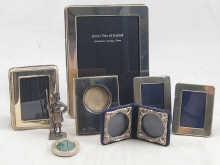 Appraisal: A mixed lot of silver comprising four photograph frames one