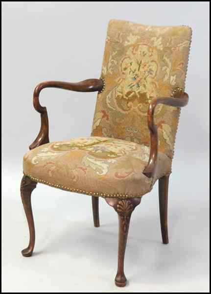 Appraisal: ENGLISH CARVED MAHOGANY OPEN ARMCHAIR With needlepoint upholstery and nailhead