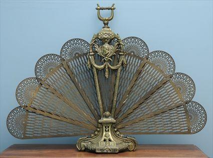 Appraisal: LOUIS XVI-STYLE GILT-METAL FAN-FORM NINE-PANEL FOLDING FIREPLACE SCREEN The arched