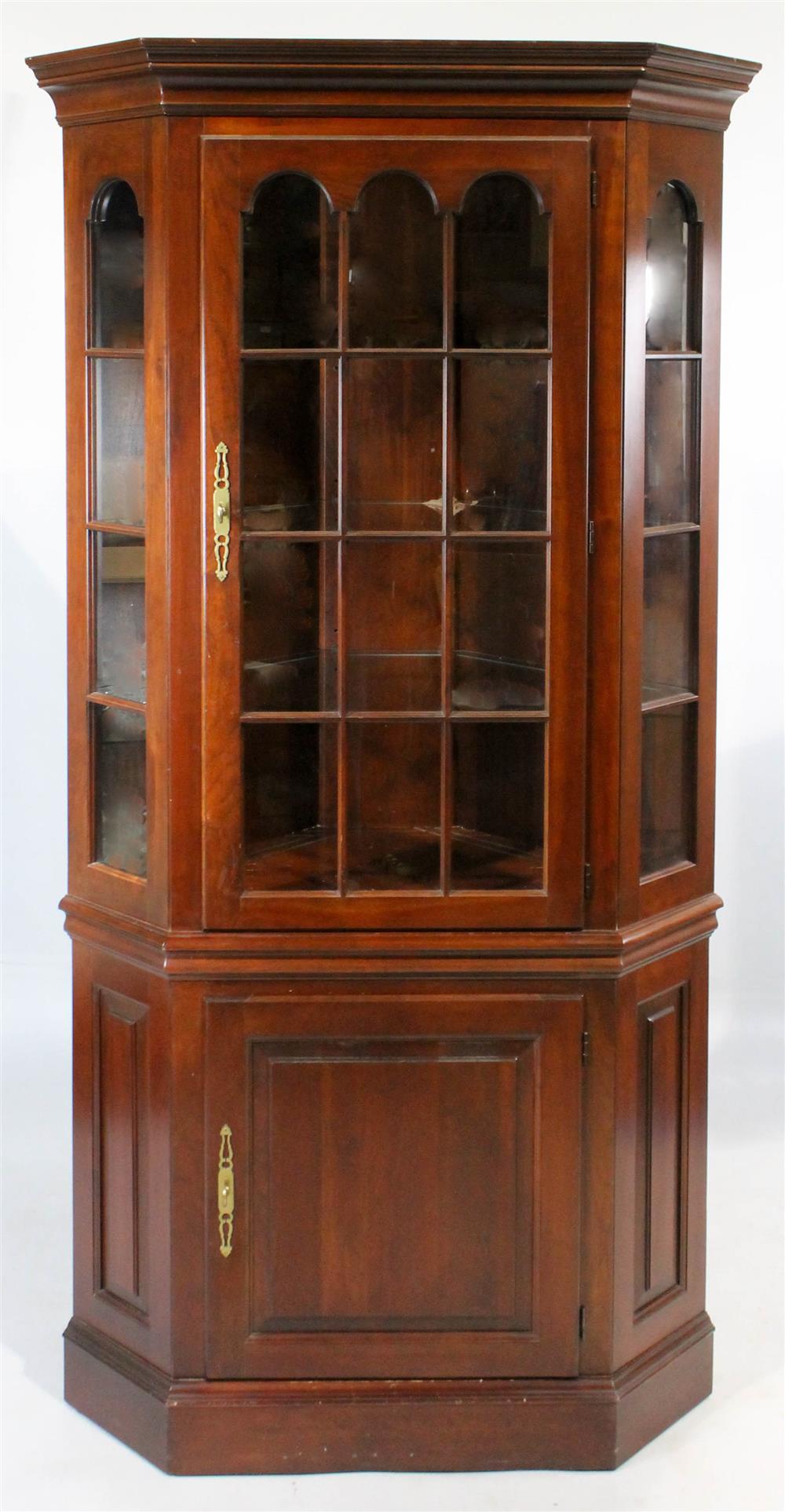 Appraisal: CHIPPENDALE STYLE CHERRY CORNER CUPBOARD LIGHTED having a straight molded