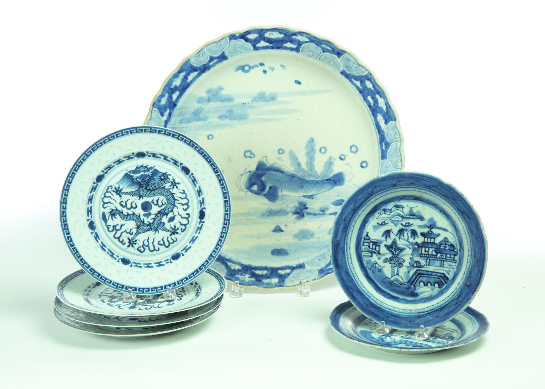 Appraisal: SEVEN BLUE AND WHITE PLATES AND CHARGER China th century