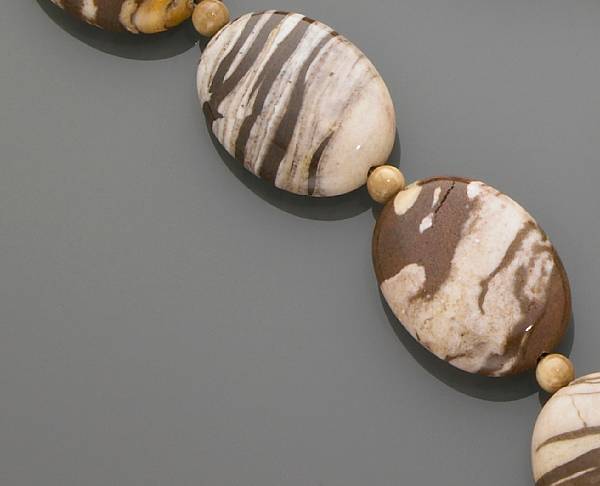 Appraisal: Zebra Agate and Woolly Mammoth Ivory Necklace Polished agate with