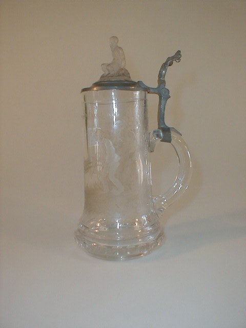 Appraisal: A German glass beer tankard etched with a comical toping